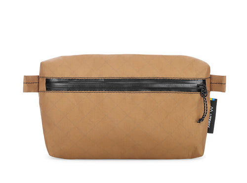 Brown toiletry bag with black zipper on a white background