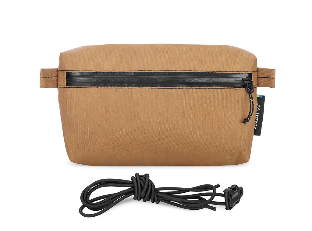 Brown pouch with black zipper and cord on a white background