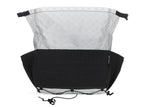 Backpack with black front panel and quilted pattern on a white background