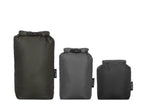 Three sizes of black dry bags on a white background