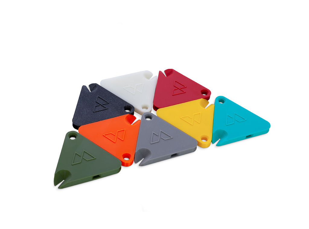 Set of colorful triangular WHISTLEs on a white background